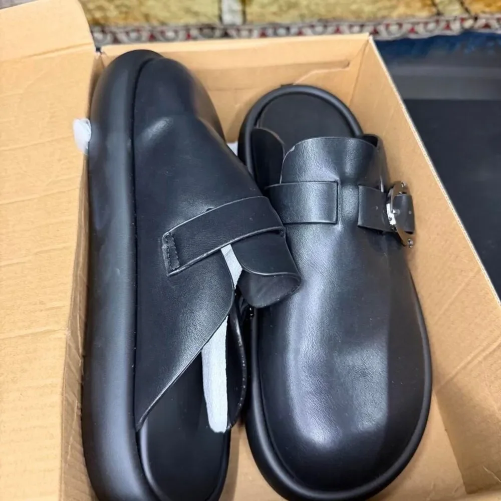 Source Unknown black leather